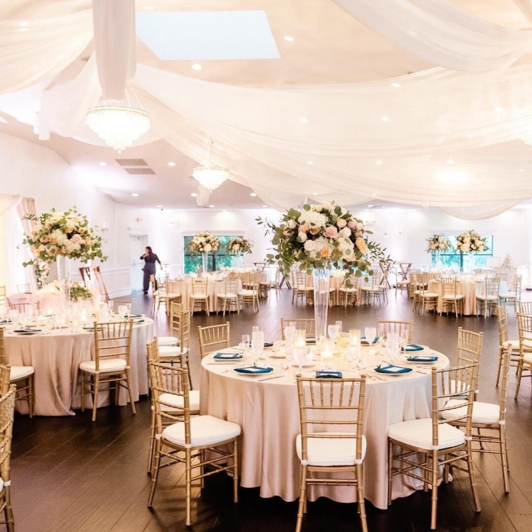 A large room with many tables and chairs