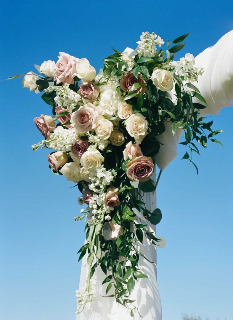 A person holding flowers in their hand