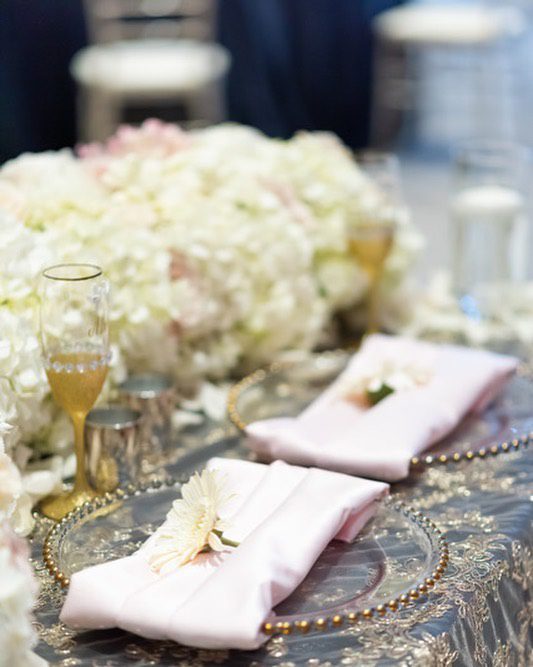 Two Napkins With Flowers on a Table
