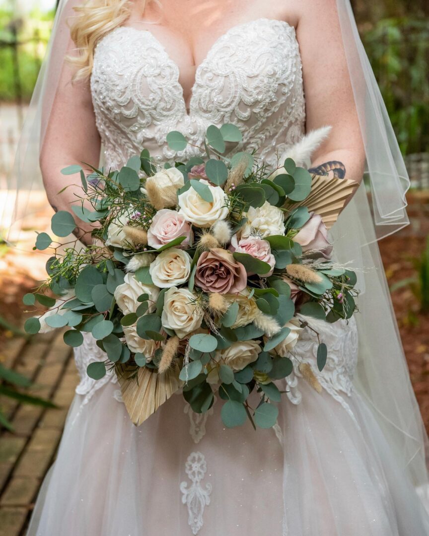 A Bride Holding a Rose Bouquet