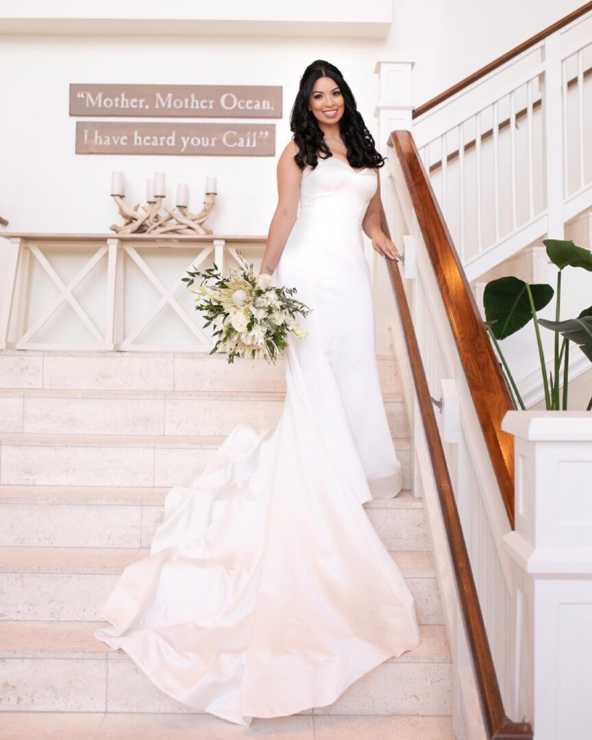 A Bride Standing by a Wooden Railing