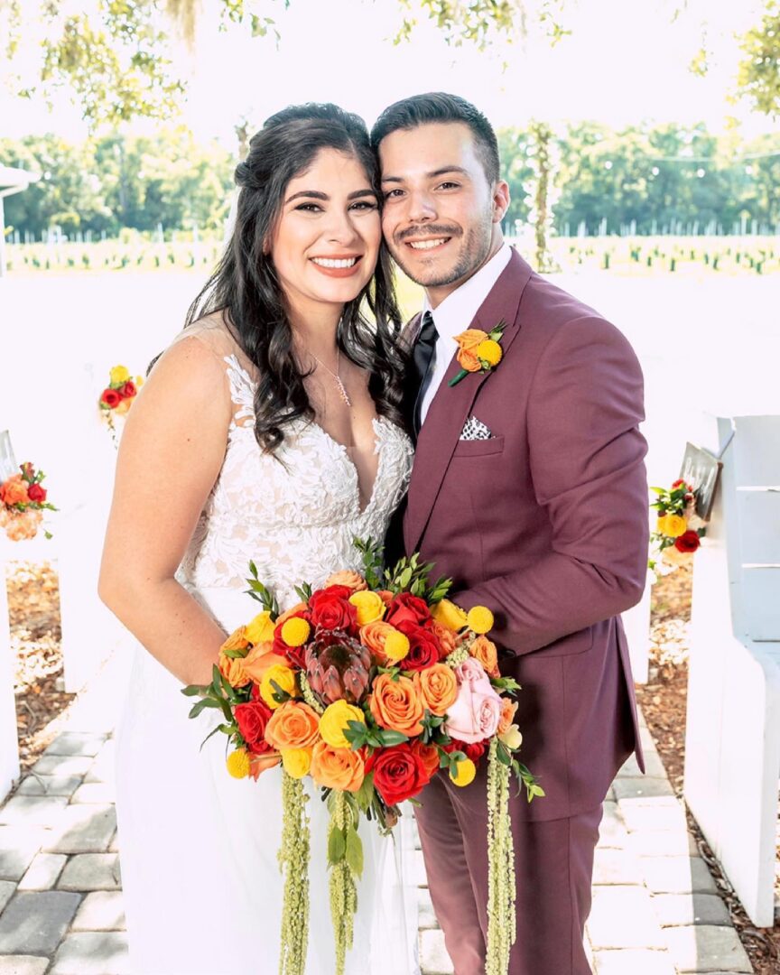 A Bride With a Groom in a Vine Color Suit