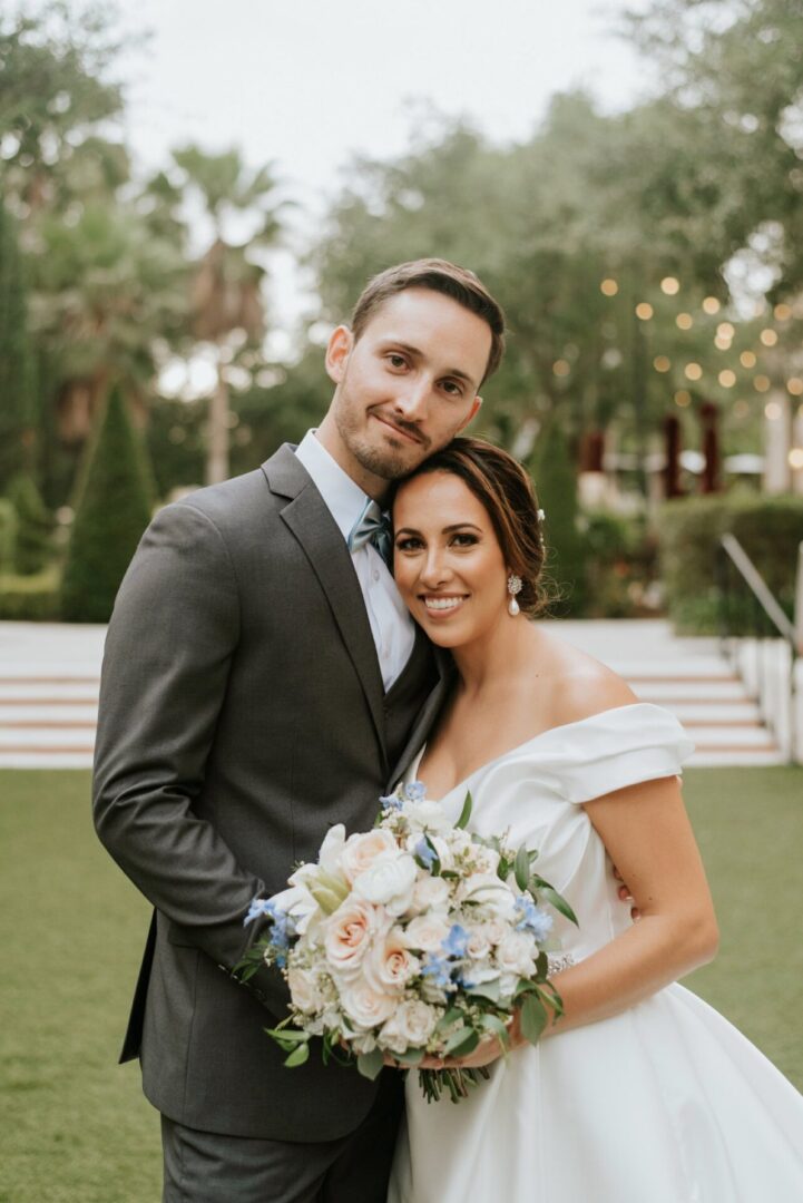 A man and woman posing for a picture.