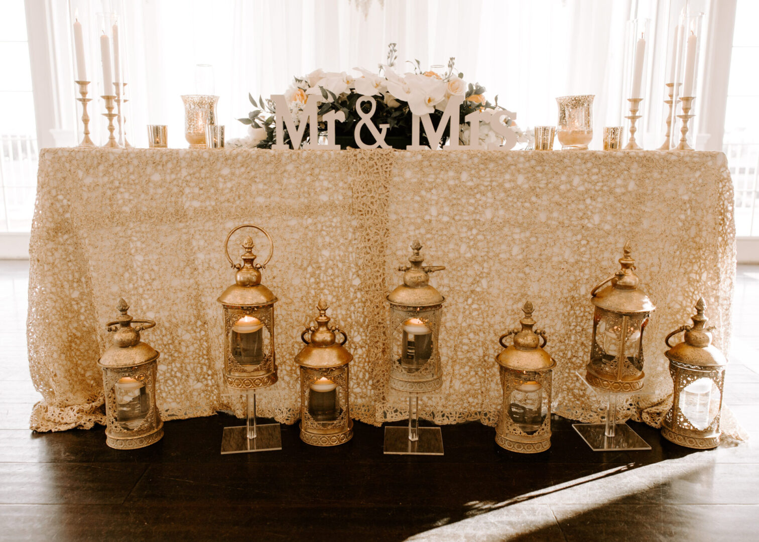 A Mr and Mrs Table Arrangement With Lanterns