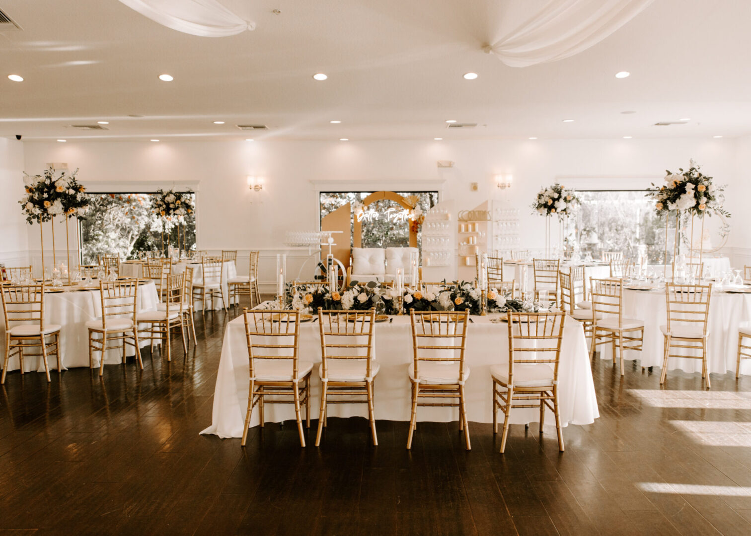 Tables With Brass Chairs in a Ceremony