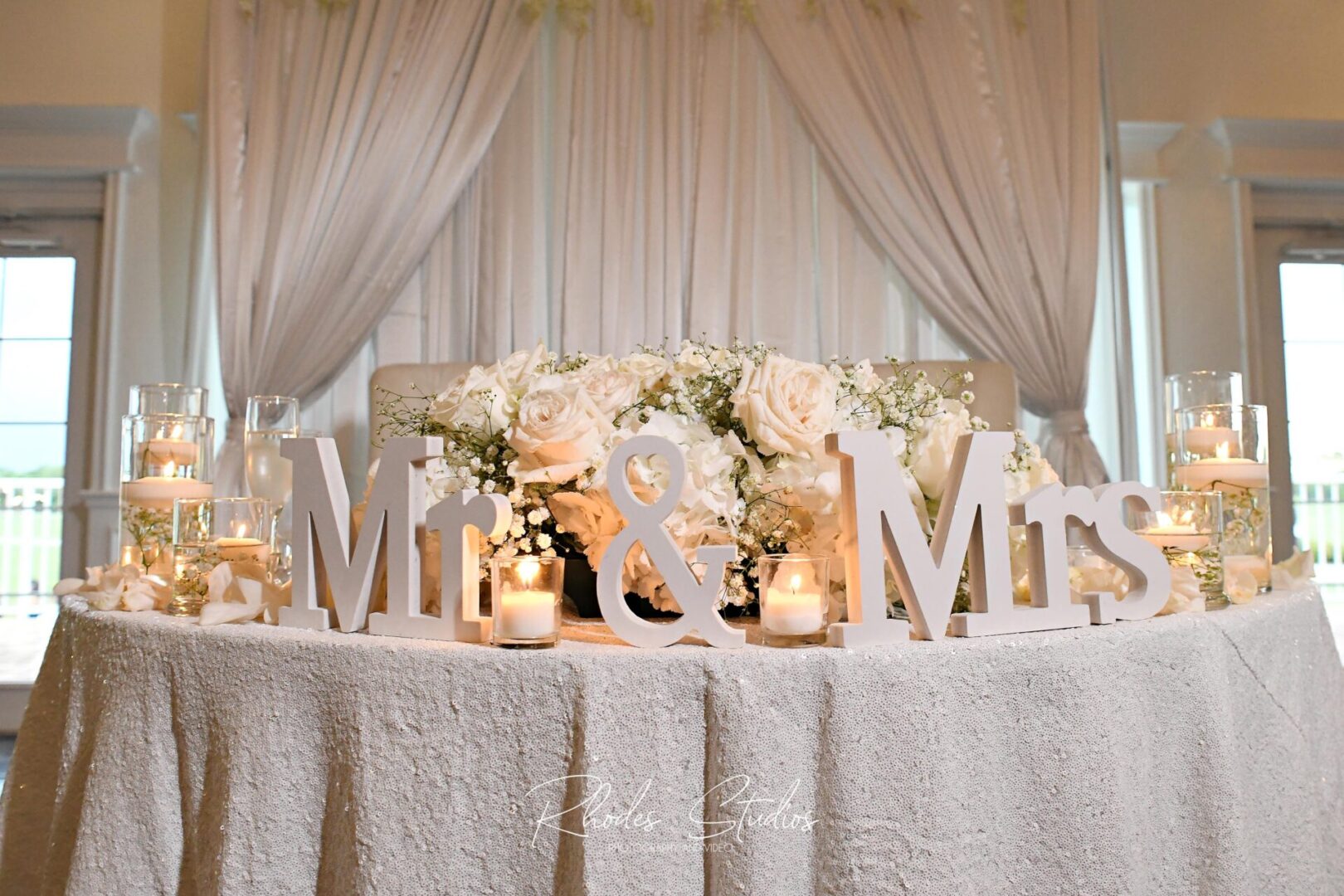 A Mr and Mrs Arrangement on a White Color Table