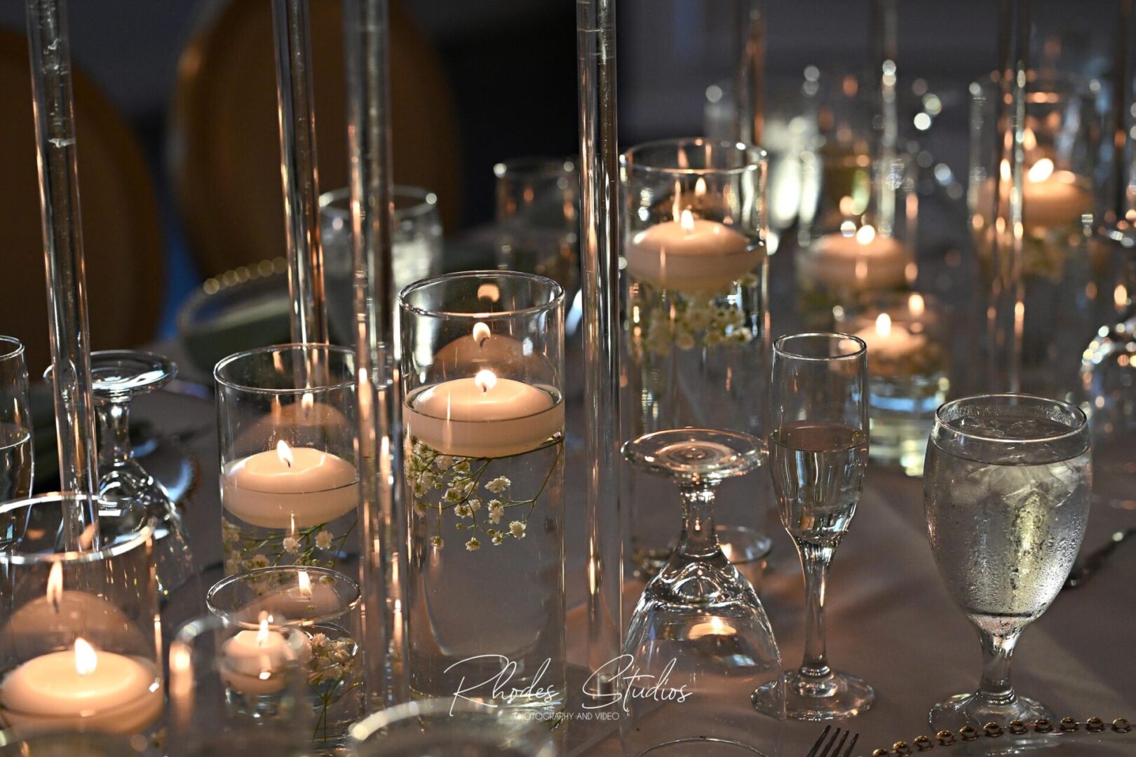 Floating Candles Placed in a Clear Glass