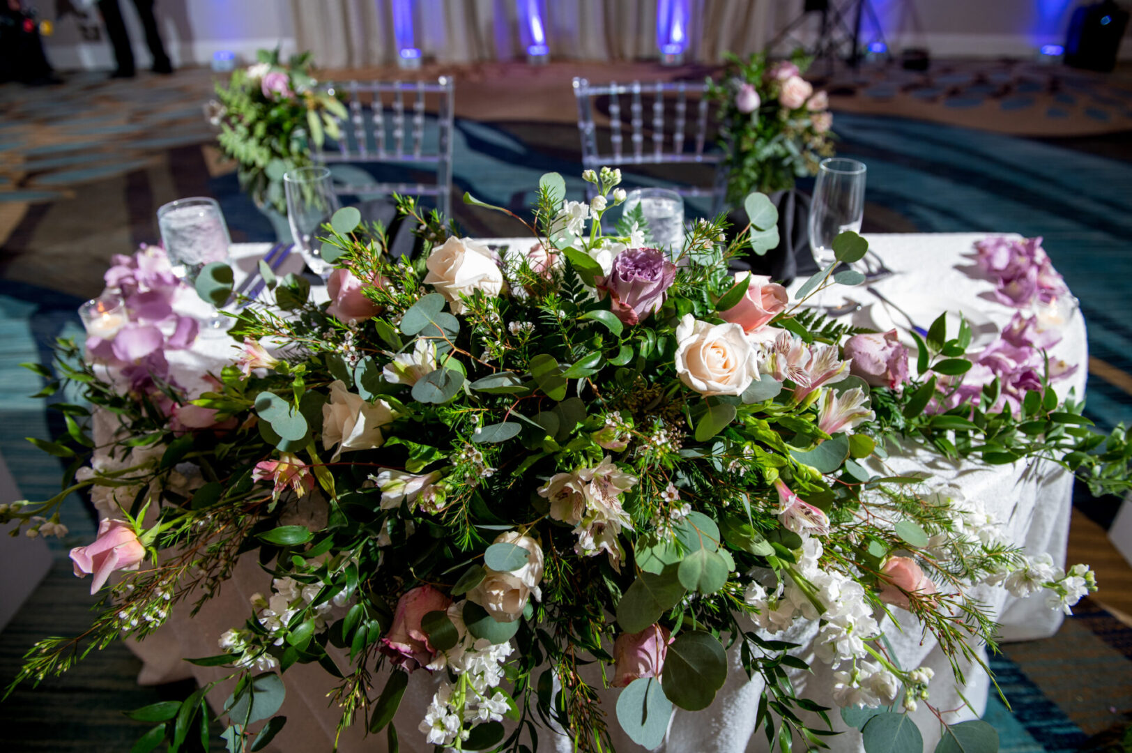 A Flower Bunch With Leaves and Flowers Placed on a Table