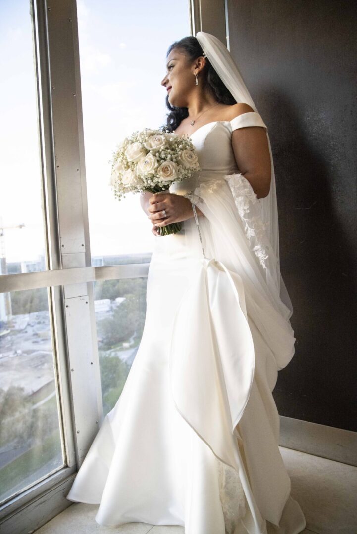 A Bride looking Out of a Window