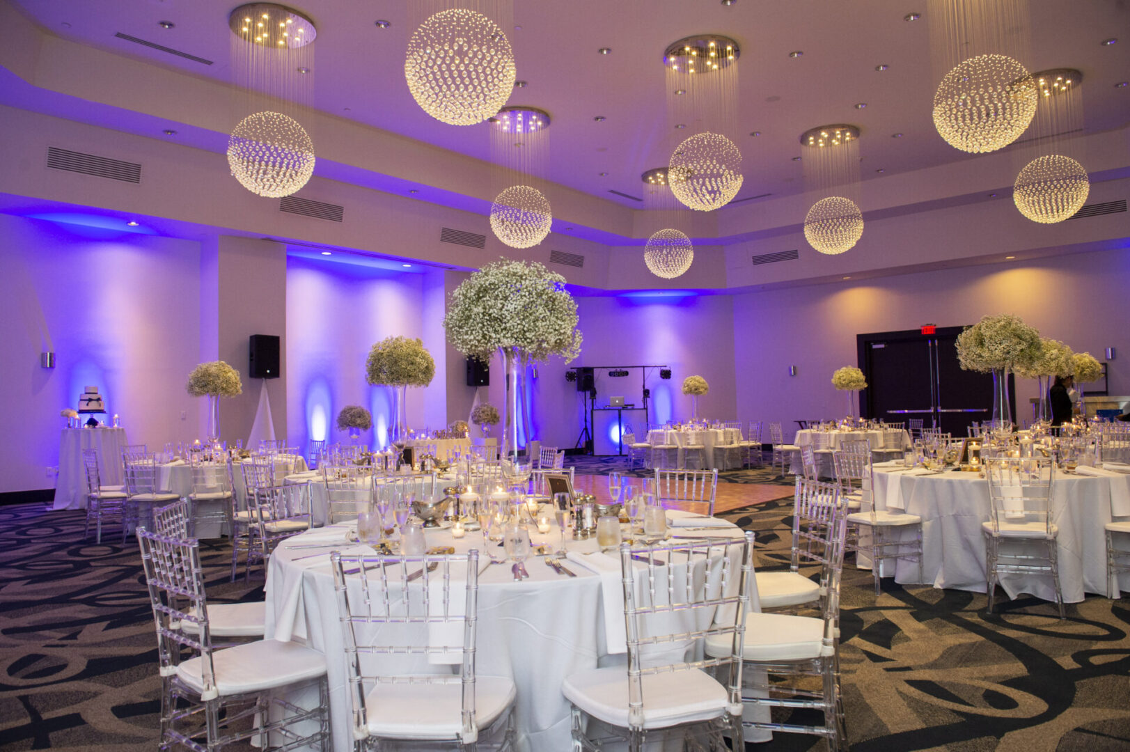 A Venue Decorated With Blue Detail Lights