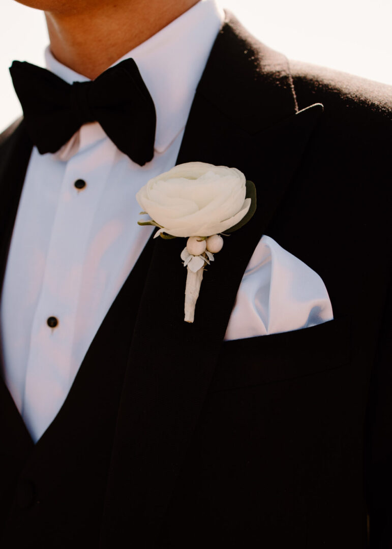 A Groom With a White Rose on the Coat